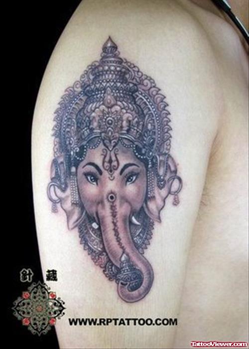 Grey Ink Elephant Head Lord Ganesha Tattoo On Right Shoulder