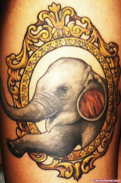 Elephant In Frame Tattoo