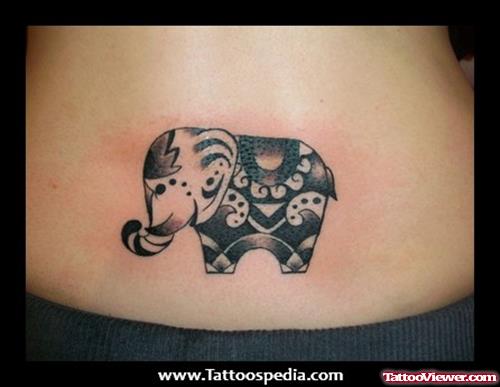 Grey And Black Elephant Tattoo On Lowerback