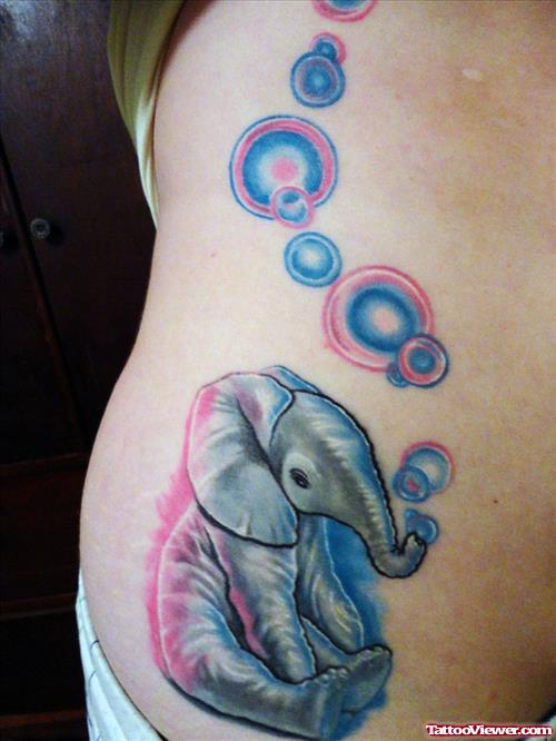 Awesome Colored Elephant Tattoo On Rib