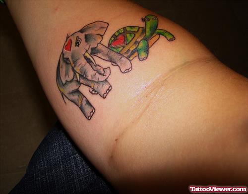Colored Turtle And Elephant Tattoo On Arm