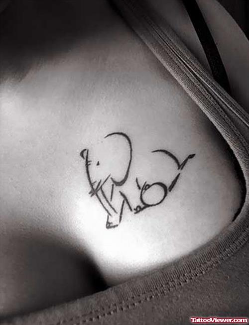 Baby Elephant Tattoo On Girl Chest