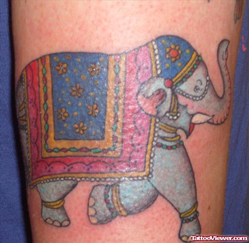 Awesome Colored Running Elephant Tattoo