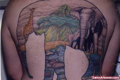 Colored Wild animals In Elephant Tattoo On Back