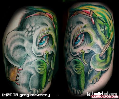 Grey And Green Ink Elephant Head Tattoo