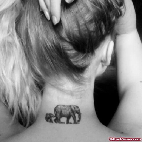Baby Elephant With Mother Elephant Tattoo On Back Neck
