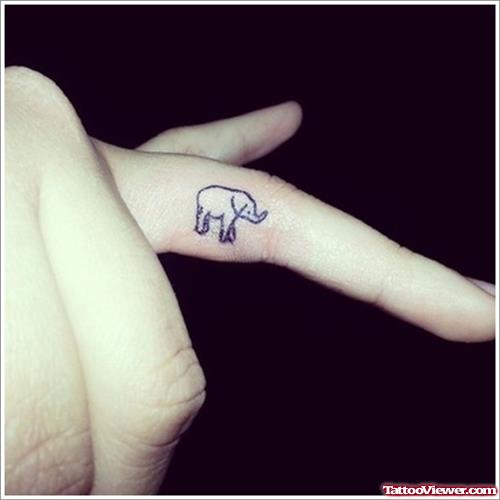 Tiny Elephant Tattoo On Finger