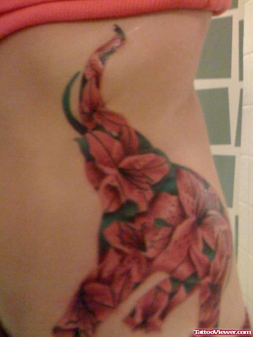 Flowers Elephant Tattoo With Up Trunk