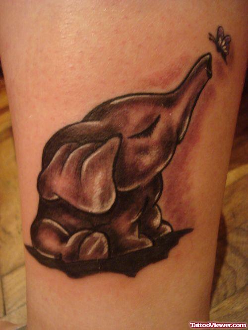 Cute Baby Elephant With Up Trunk Tattoo