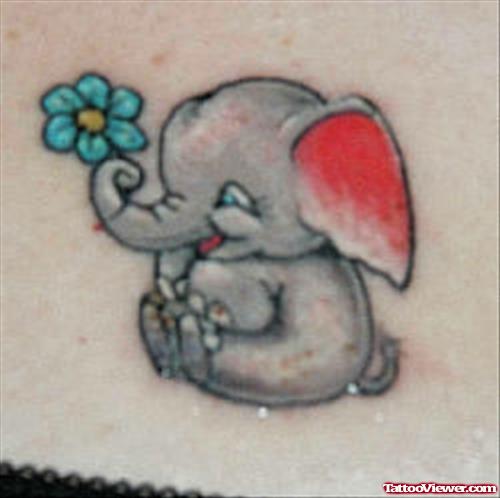 Blue Flower And Baby Elephant Tattoo