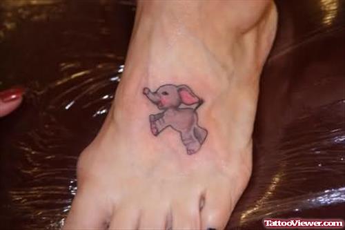 Tiny Elephant Tattoo On Foot