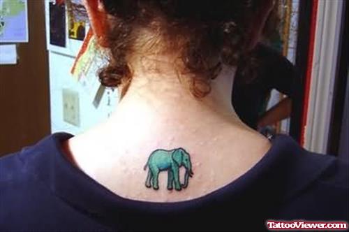 Tiny Elephant Tattoo On Back Neck