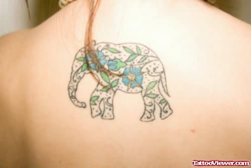 Flowers Design Elephant Tattoo On Back