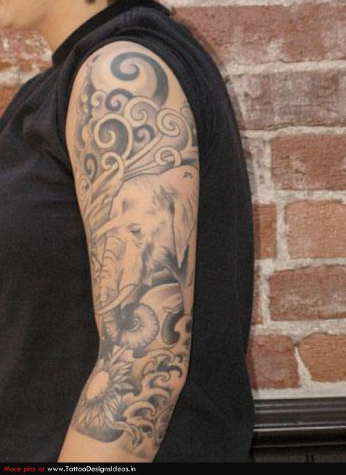 Grey Flowers And Elephant Tattoo On Left Sleeve