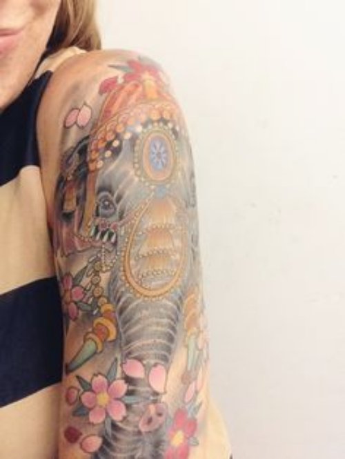 Flowers And Elephant Tattoo On Left Half Sleeve