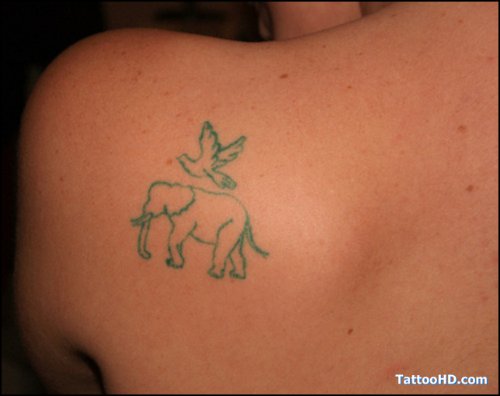 Green Flying Bird And Elephant Tattoo On Left Back