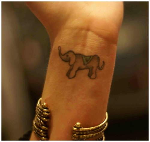 Small Elephant Tattoo On Left Wrist
