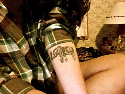 Black Ink Tribal Elephant Tattoo On Left Arm