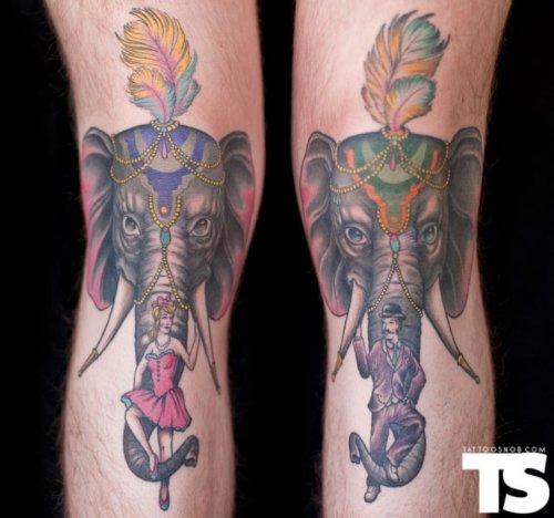 Circus Elephant Head With Colored Feathers Tattoo