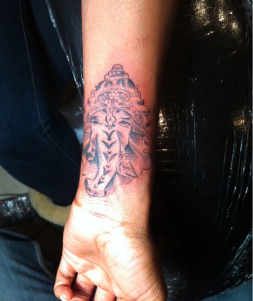 Elephant Head Tattoo On Left Arm
