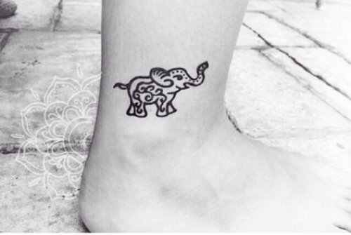 Tiny Baby Elephant Tattoo On Ankle