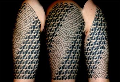 Grey And Black Ink Escher Tattoo On Sleeve