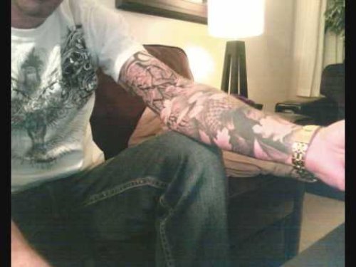Attractive Escher Tattoo On Left Sleeve