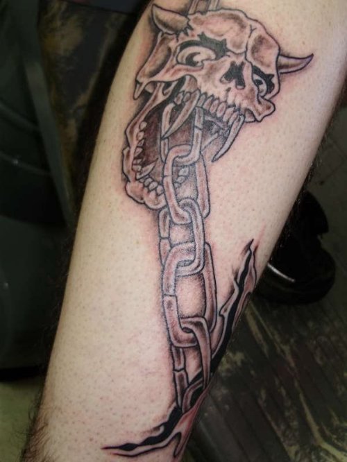 Evil Skull And Chain Tattoo