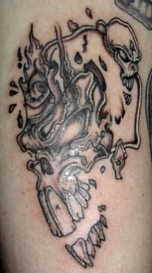 Grey Ink Evil Skull Tattoo