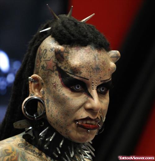 Extreme Demon Face Tattoo And Piercing