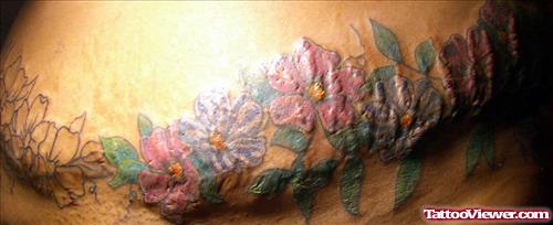 Extreme Colored Flowers Tattoo