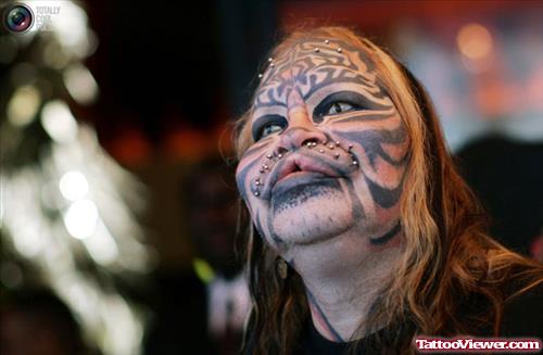 Extreme Black Tribal Tattoo On Face
