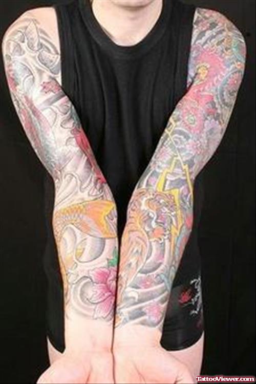 Colored Extreme Tattoos On Both Sleeves