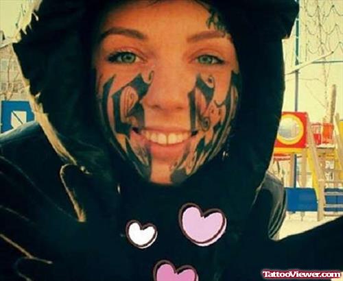 Extreme Tribal Tattoo On Girl Face