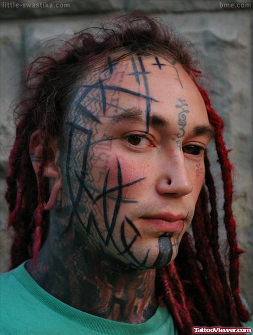 Extreme Tribal Tattoo On Face