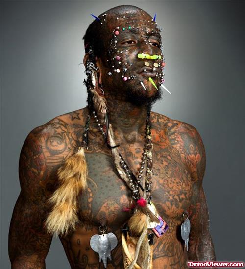 Extreme Black Ink Tattoo On Man Full Body