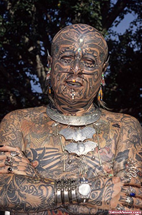 Extreme Black Ink Tattoo On Face And Body