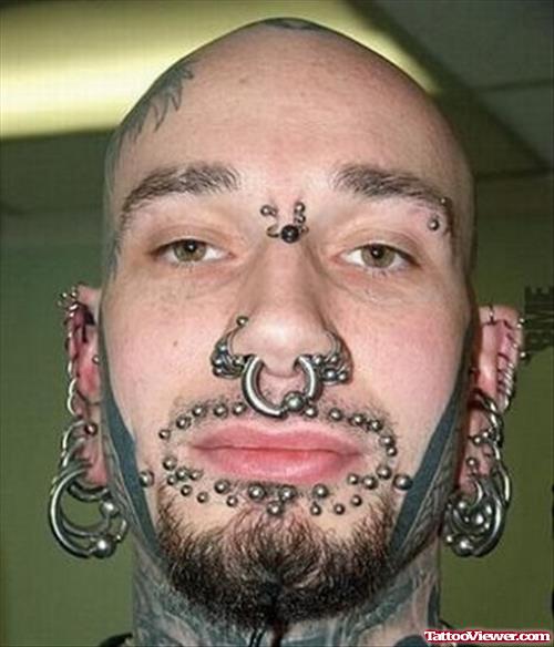 Extreme Black Ink Face Tattoo And Piercing