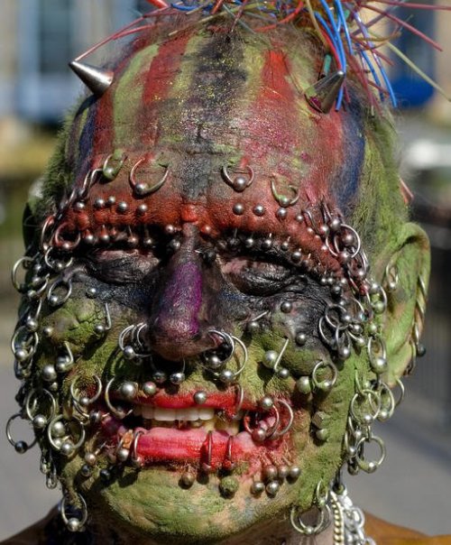 Amazing Extreme Face Tattoo And Piercing