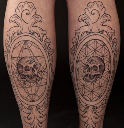 Skull In Frame Extreme Tattoo