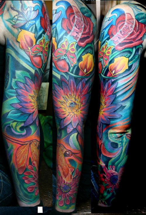 Extreme Colored Flower Tattoo On Sleeve