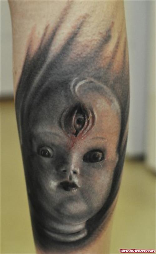 Creepy Doll Head With Third Eye Tattoo