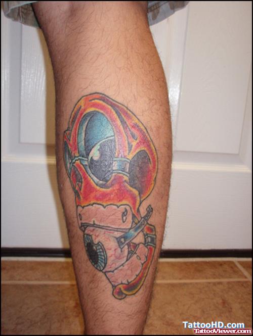 Colored Skull With Eye Tattoo On Leg