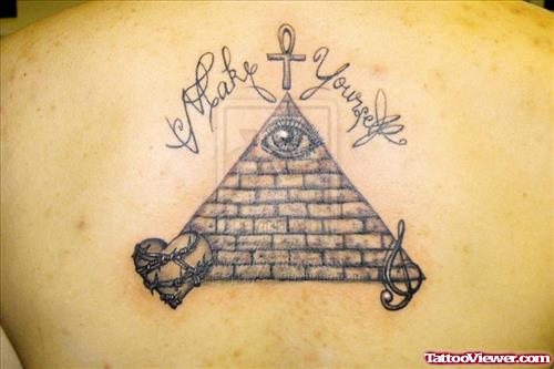 Ankh And Triangle Eye Tattoo On Back