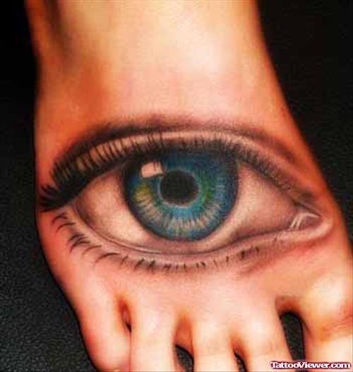 Colored Eye Tattoo On Right foot