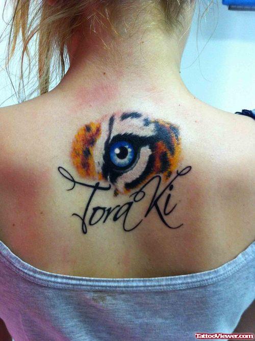 Awesome Toraki Tiger Eye Tattoo On  Girl Upperback