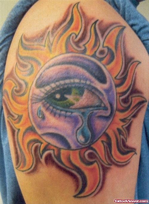 Tribal Sun And Eye Tattoo On Half Sleeve
