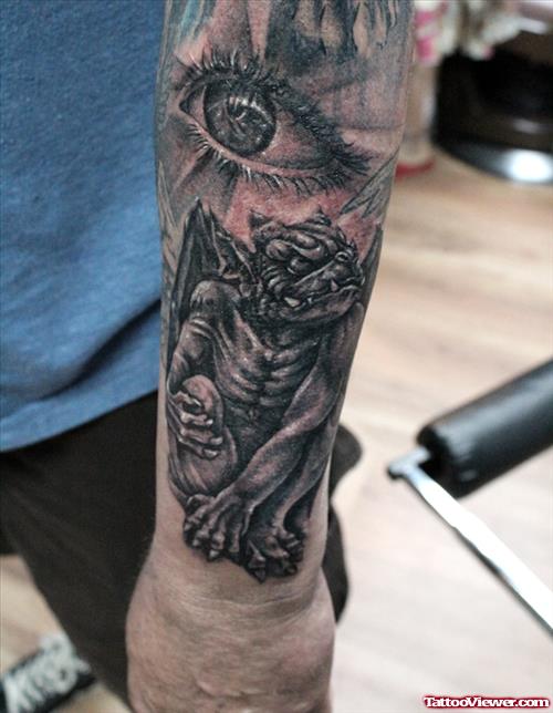 Gargoyle And Eye Tattoo On Left Sleeve