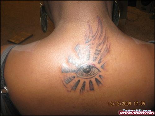 Amazing Grey Ink Eye Tattoo On Upperback
