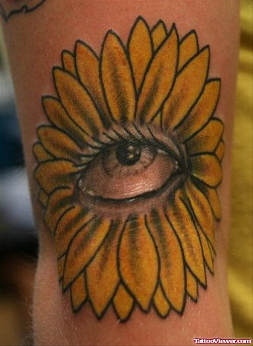 Yellow Flower With Eye Tattoo